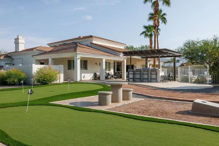 Putting, grilling, and outdoor fun come together in this spacious backyard designed for unforgettable Scottsdale days.