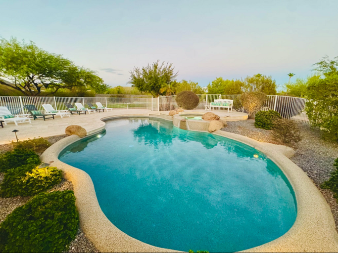 Unwind by the sparkling private pool, surrounded by peaceful desert landscaping and plenty of space to soak up the Arizona sunshine.