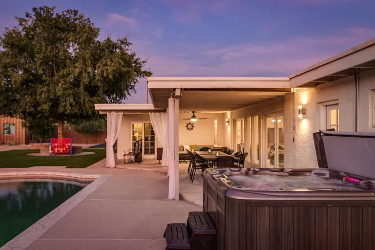 Hot Tub Overlooking Outdoor Dining Area & Pool Hot Tub Overlooking Outdoor Dining Area & Pool