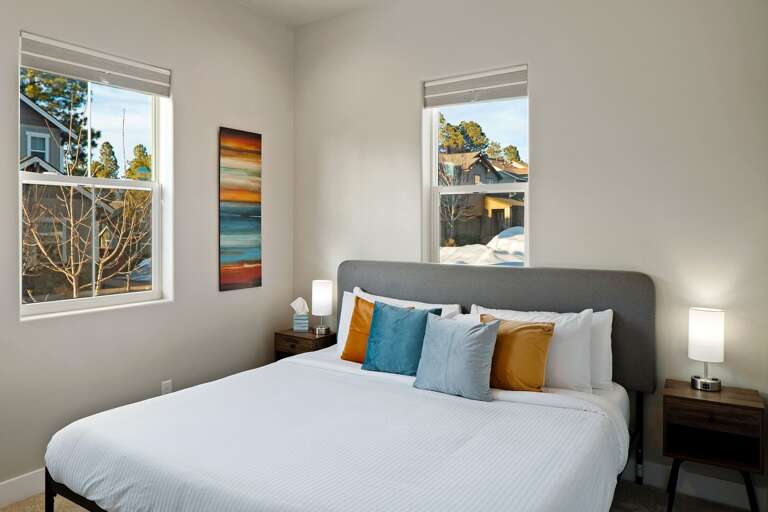 Arizona sunset colors decor liven this bottom bedroom.