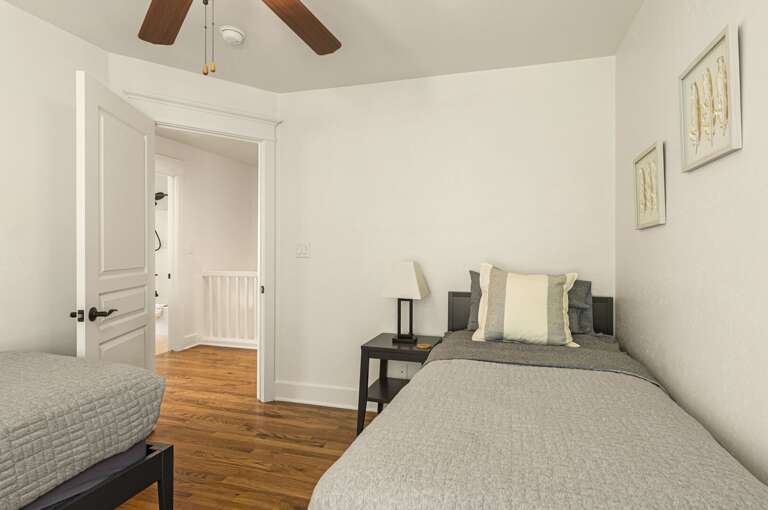 2nd Floor: Third Bedroom – Two twin beds, ideal for kids or friends. 2nd Floor: Third Bedroom – Two twin beds, ideal for kids or friends.