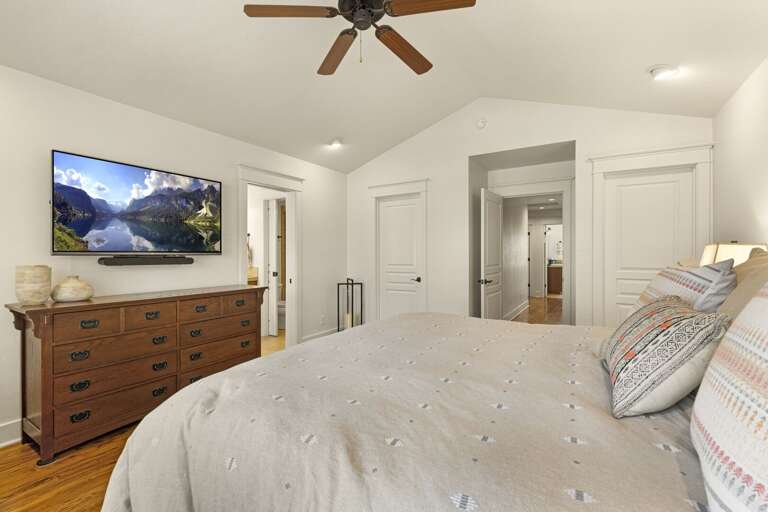 Master Bedroom – King bed, walk-in closet, TV, and spa-like ensuite bathroom with dual sinks, oversized tub, and walk-in shower. Master Bedroom – King bed, walk-in closet, TV, and spa-like ensuite bathroom with dual sinks, oversized tub, and walk-in shower.
