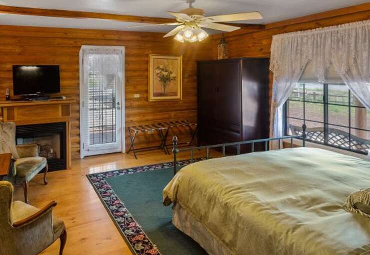 It also includes a cozy fireplace and a private entrance for added convenience.