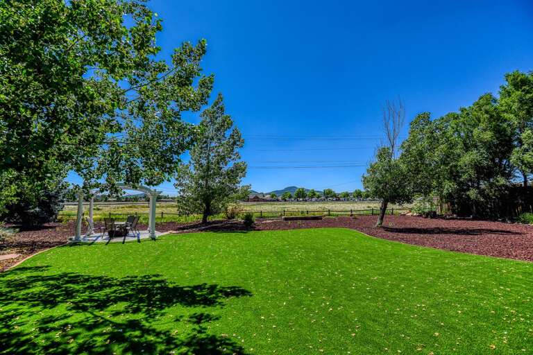 The beautiful event turf in the back of the Lodge.