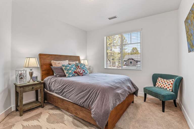 2nd Floor - Bedroom 3: Queen bed, smart TV, and lounge chair 2nd Floor - Bedroom 3: Queen bed, smart TV, and lounge chair