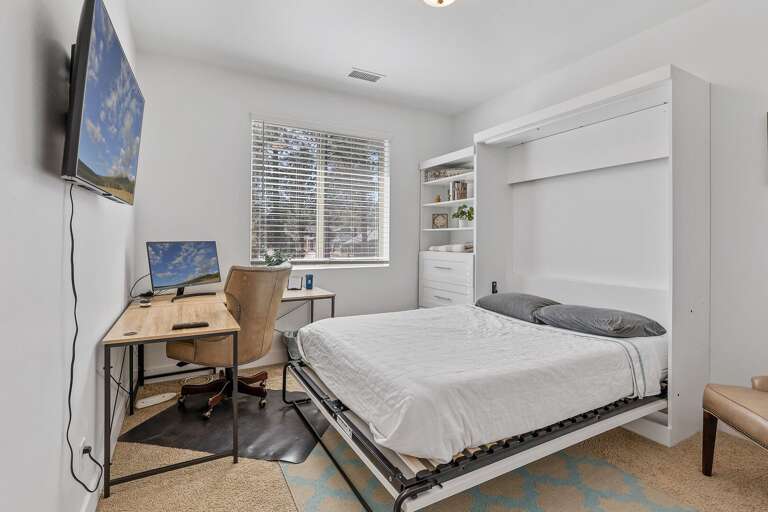 2nd Floor - Bedroom 5/Office Combo: Queen Murphy Bed and workspace with monitor and smart TV 2nd Floor - Bedroom 5/Office Combo: Queen Murphy Bed and workspace with monitor and smart TV
