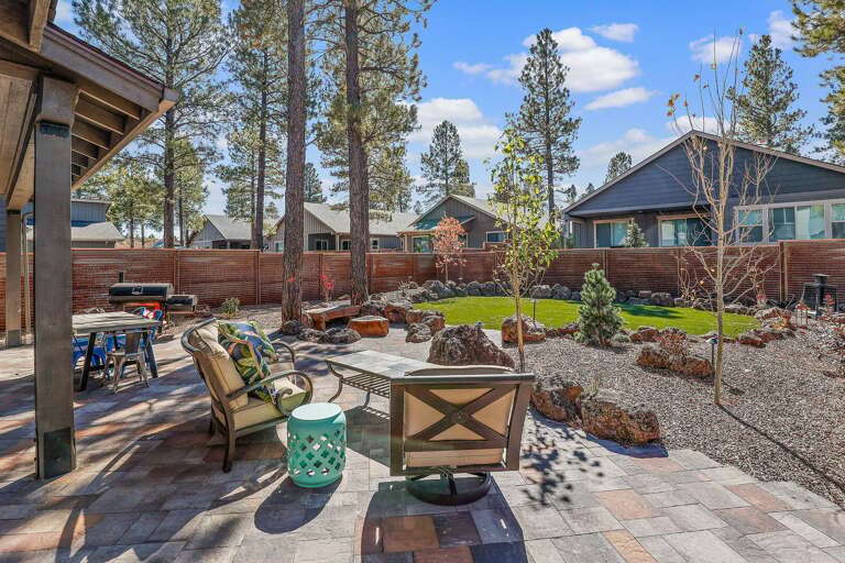 Step through the sliding door from the main living area and into the private backyard oasis. Step through the sliding door from the main living area and into the private backyard oasis.