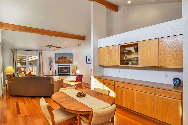 The kitchen flows into the dining area, where you can enjoy meals around the dining table for four. The kitchen flows into the dining area, where you can enjoy meals around the dining table for four.