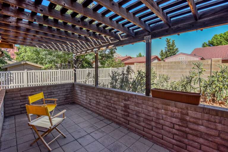 Master Suite: Features a king-size bed, Smart TV, comfy chair with ottoman, and an en suite with Master Suite: Features a king-size bed, Smart TV, comfy chair with ottoman, and an en suite with