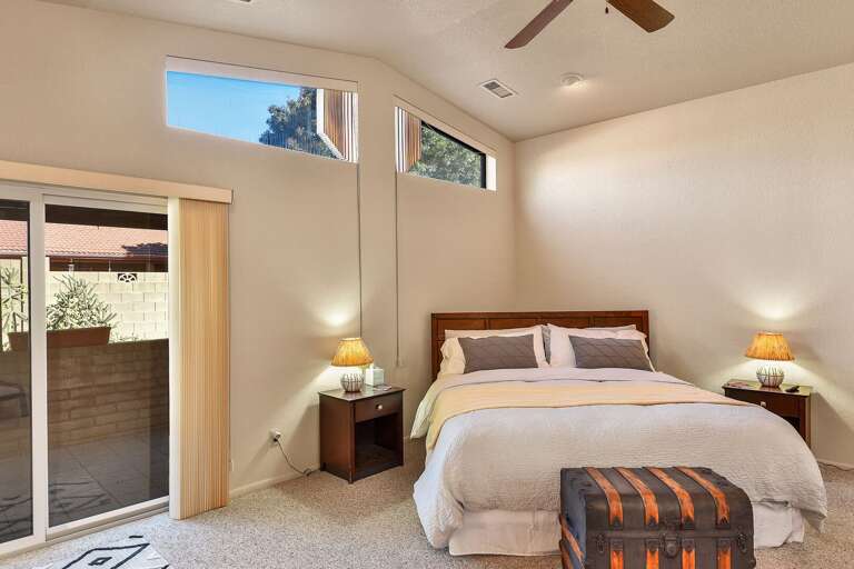 Master Suite: Features a king-size bed, Smart TV, comfy chair with ottoman, and an en suite with Master Suite: Features a king-size bed, Smart TV, comfy chair with ottoman, and an en suite with