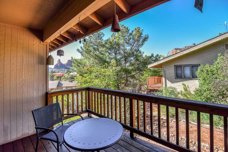 This room also offers access to a lovely deck through glass sliding doors, where you can relax and enjoy the scenic surroundings. This room also offers access to a lovely deck through glass sliding doors, where you can relax and enjoy the scenic surroundings.