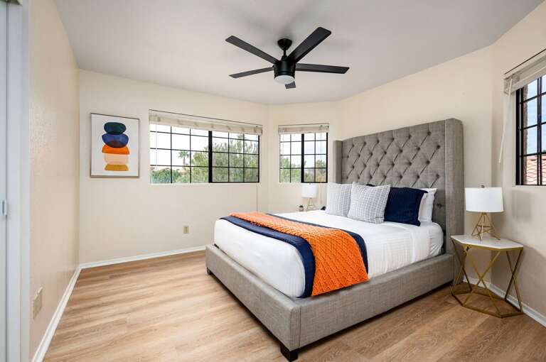 This corner bedroom is located near the stairs. This corner bedroom is located near the stairs.