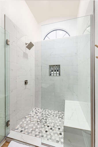 Walk in Master shower with seating. Walk in Master shower with seating.