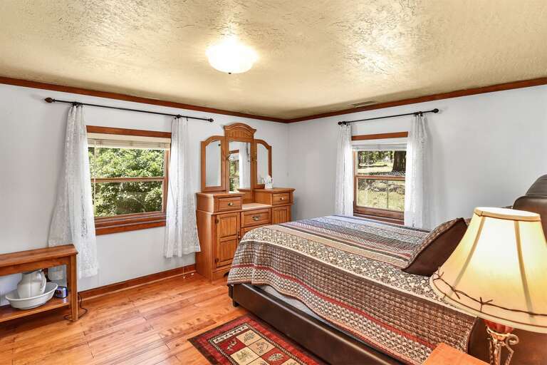 Bedroom 1: Queen bed with authentic rustic decor
