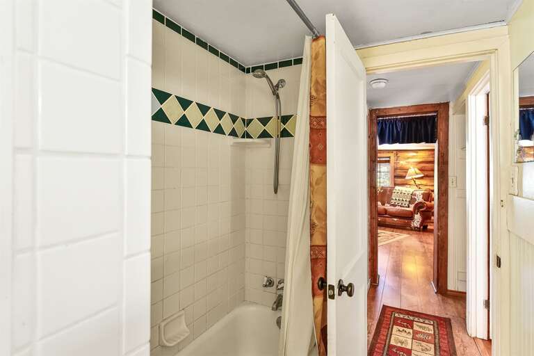 Convenience and comfort come together in this homestead bathroom, toilet and shower
