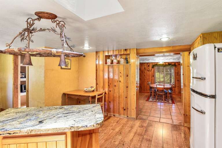 Vintage-style kitchen with ample storage and island seating