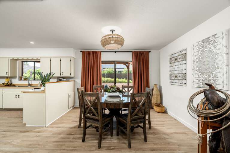 Dining area with ample seating for 6 and large windows to enjoy scenic views while you eat. Dining area with ample seating for 6 and large windows to enjoy scenic views while you eat.