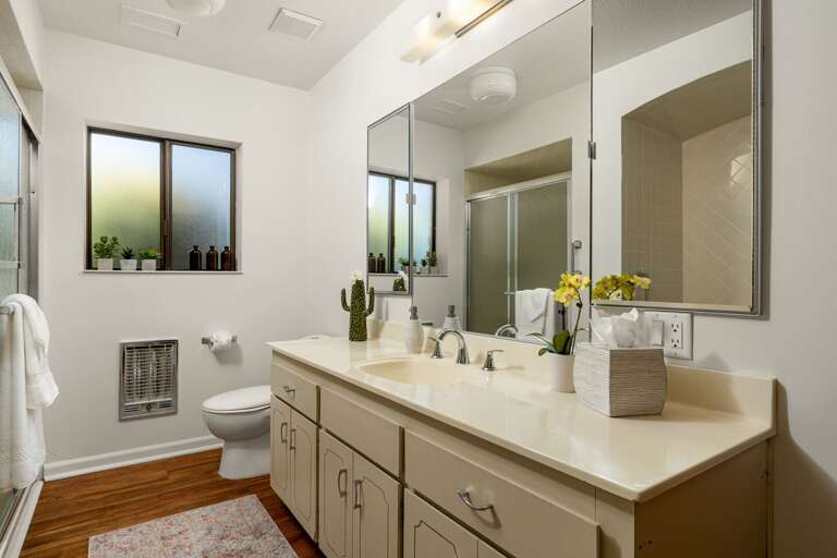 Shared Full Bathroom: Boasts a contemporary walk-in shower and a relaxing soaking tub, sophisticated fixtures, and plenty of space to meet your needs. Shared Full Bathroom: Boasts a contemporary walk-in shower and a relaxing soaking tub, sophisticated fixtures, and plenty of space to meet your needs.