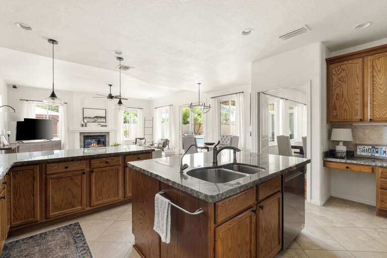 Kitchen Overlooks Living & Dining Area