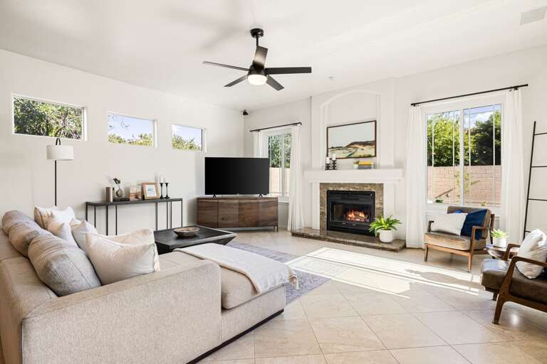 Large TV, Fireplace, Comfortable Seating, and Direct Patio Access