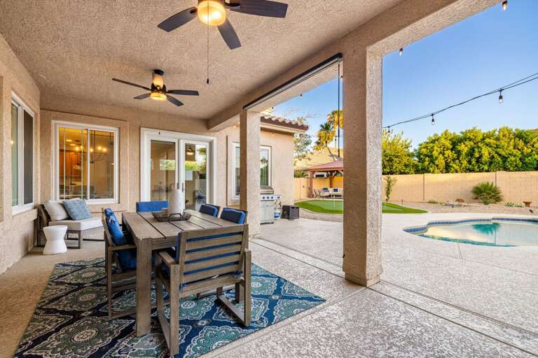 Outdoor Dining, Pool, Putting Green, and Shaded Pergola