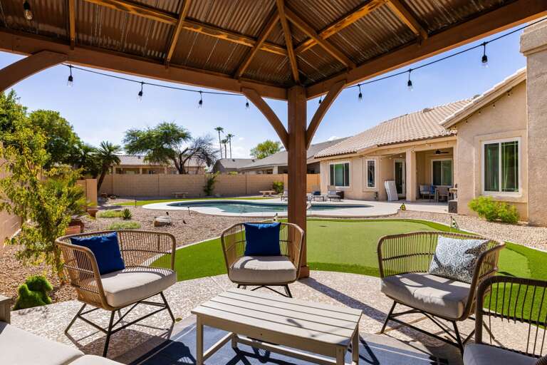 Pergola Sitting, Putting Green, Pool, Cornhole, and More!