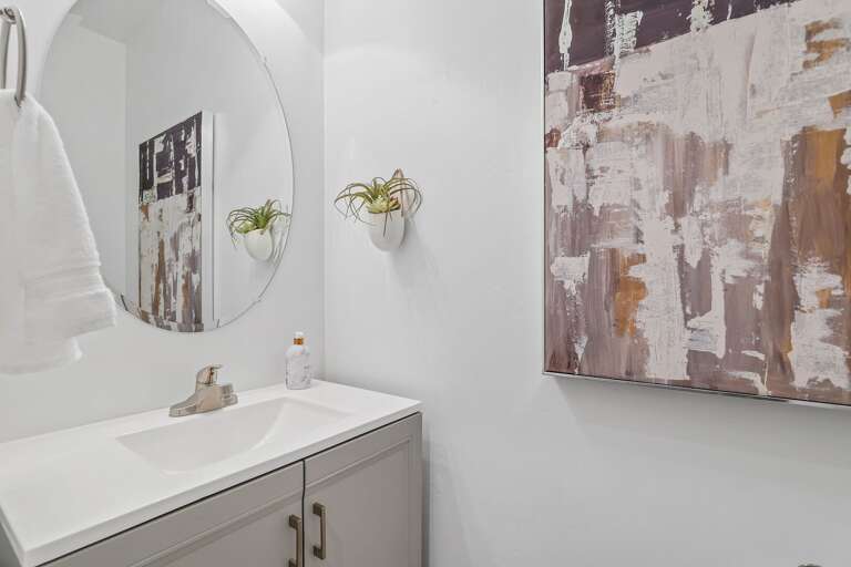 Half Bathroom near the living room for convenience. Half Bathroom near the living room for convenience.