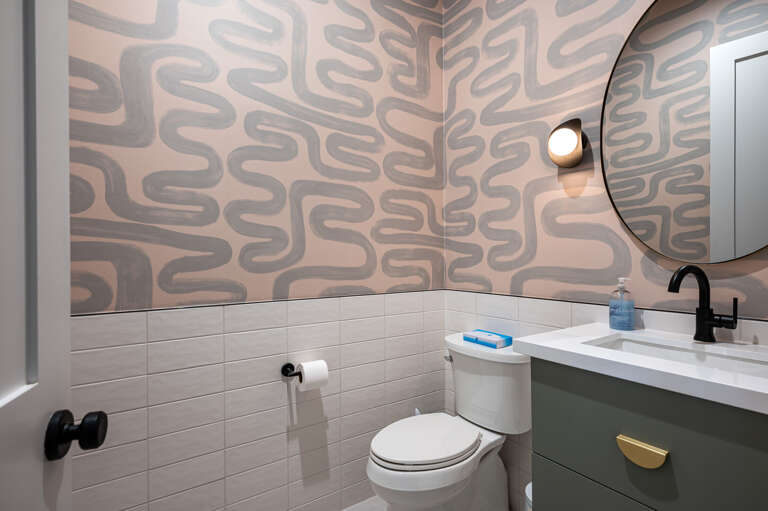 Half bathroom in the hall. Half bathroom in the hall.