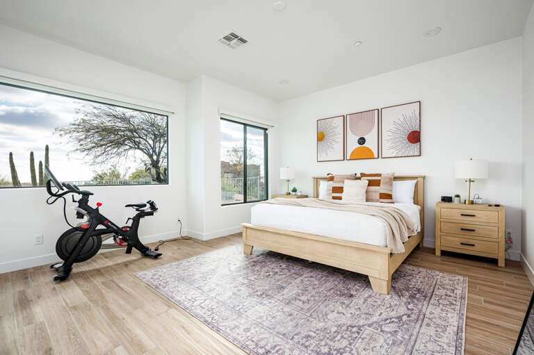 Master bedroom with Pelaton bike. Master bedroom with Pelaton bike.