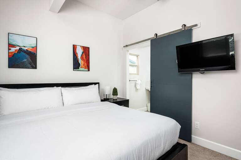 Bedroom two with large king bed and TV. Bedroom two with large king bed and TV.