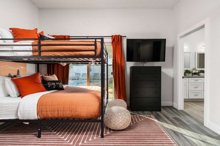 Bunk Bedroom Featuring TV & En-suite Bathroom.