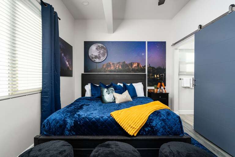 Comfortable Bedroom Featuring a Cozy Bed & En-suite Bathroom.