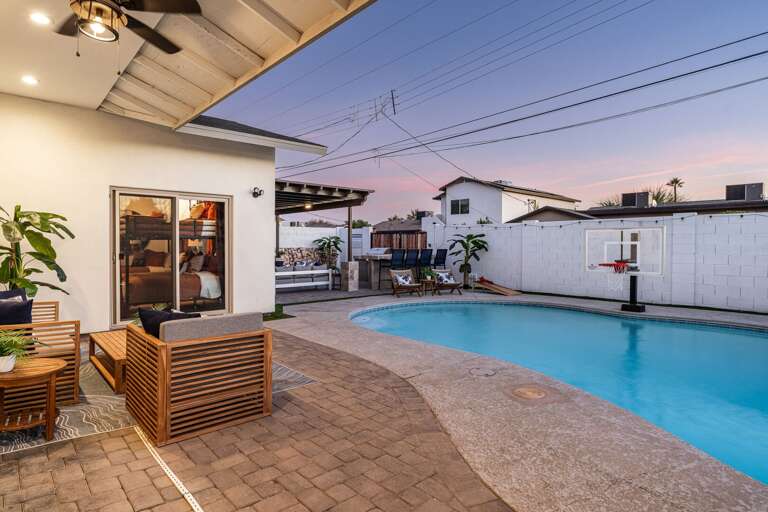 Covered Patio Seating Next to Pool