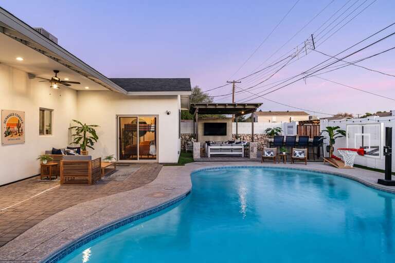 Private Pool w/ Lounge Seating & Outdoor Entertainment Areas