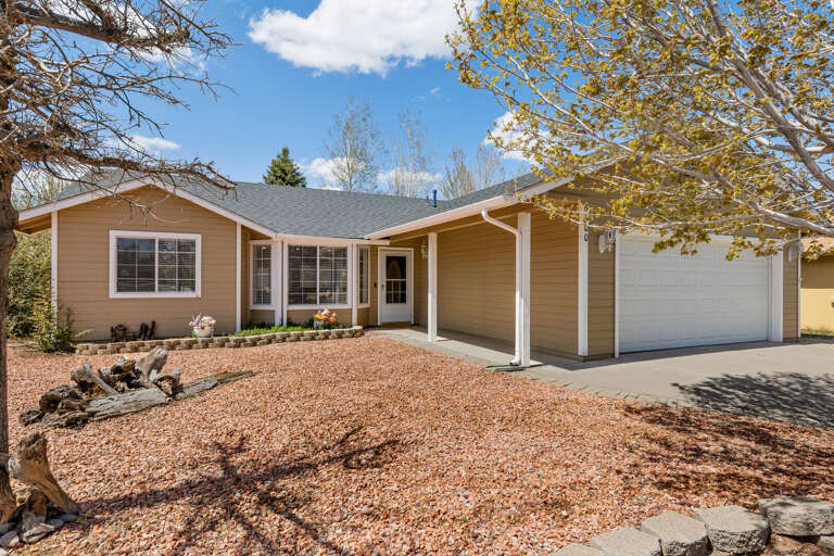 Two-Car Garage: Spacious garage for parking and additional storage.  Driveway Parking: Plenty of room with driveway space for two additional vehicles. Two-Car Garage: Spacious garage for parking and additional storage.  Driveway Parking: Plenty of room with driveway space for two additional vehicles.