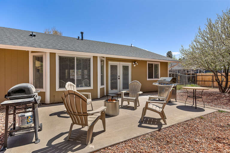 The fenced backyard is a haven for outdoor fun. The fenced backyard is a haven for outdoor fun.