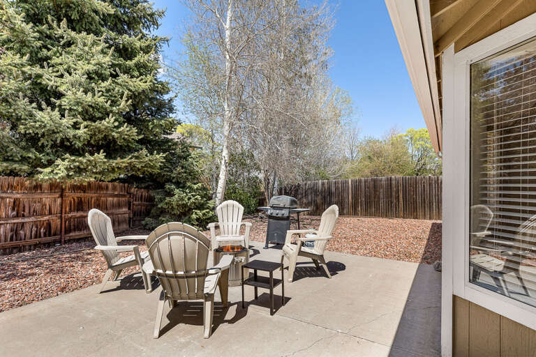 The fenced backyard is a haven for outdoor fun. The fenced backyard is a haven for outdoor fun.