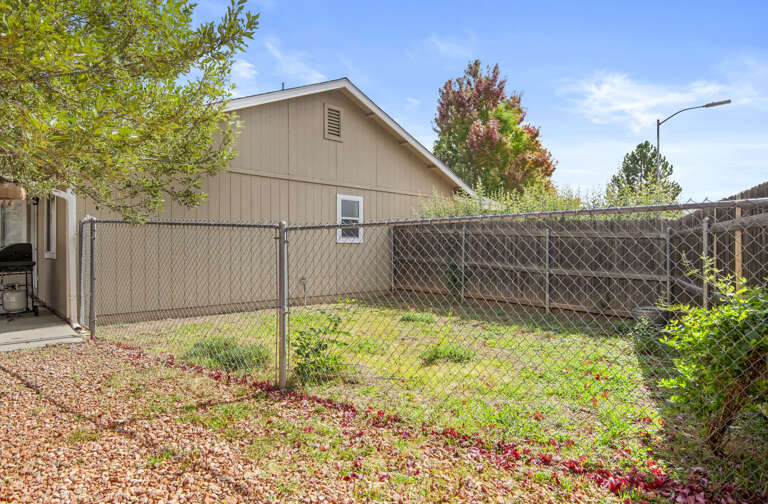 Fully fenced yard for  pets to run free Fully fenced yard for  pets to run free