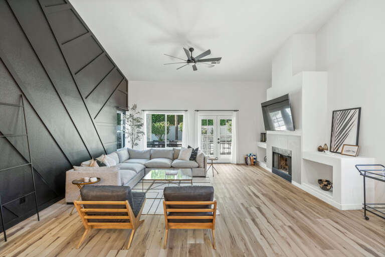 Living Area w/ Large Mounted TV Living Area w/ Large Mounted TV