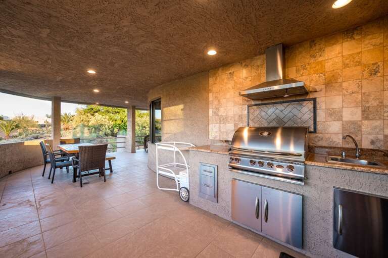 Grill Area w/ Outdoor Dining Area in Background