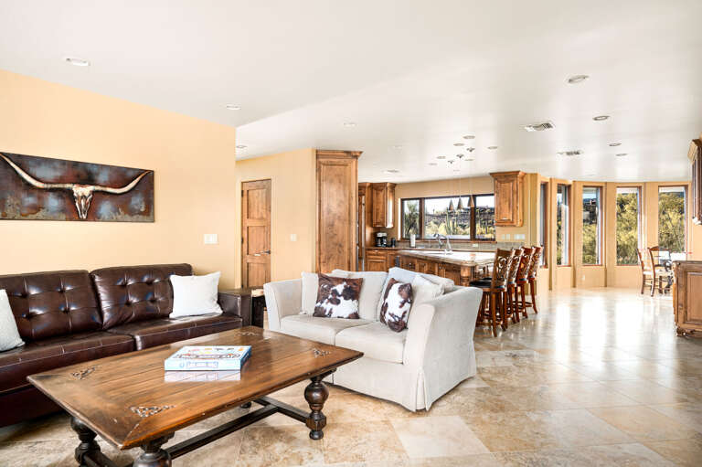 Living Area w/ Kitchen in Background