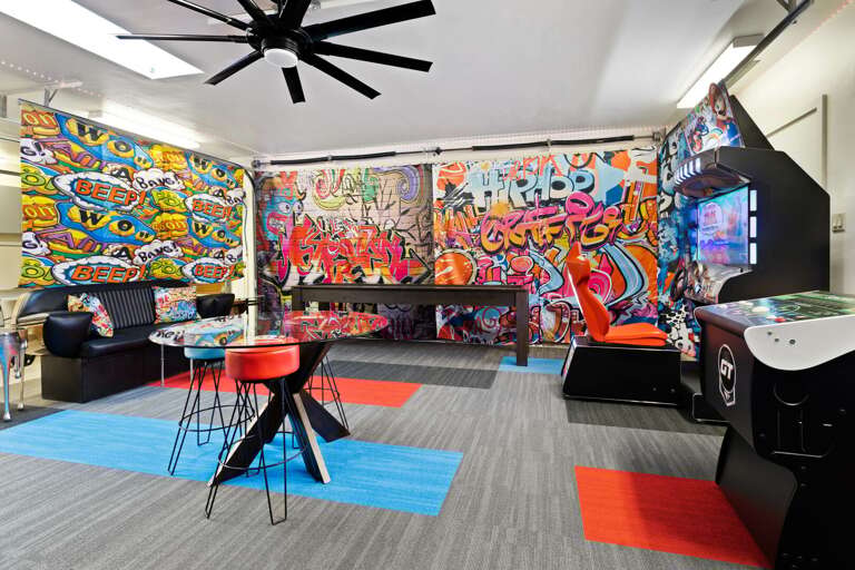 Arcade Room Games & Seating Area Arcade Room Games & Seating Area