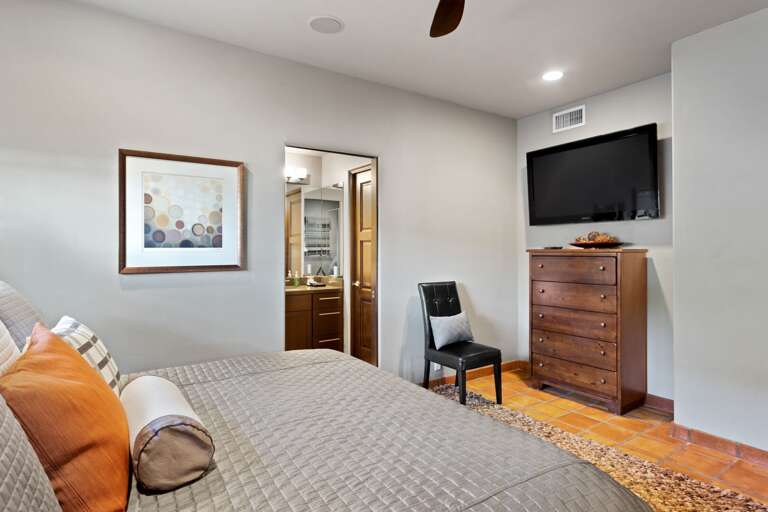 Bedroom Five w/ King Bed & TV Bedroom Five w/ King Bed & TV