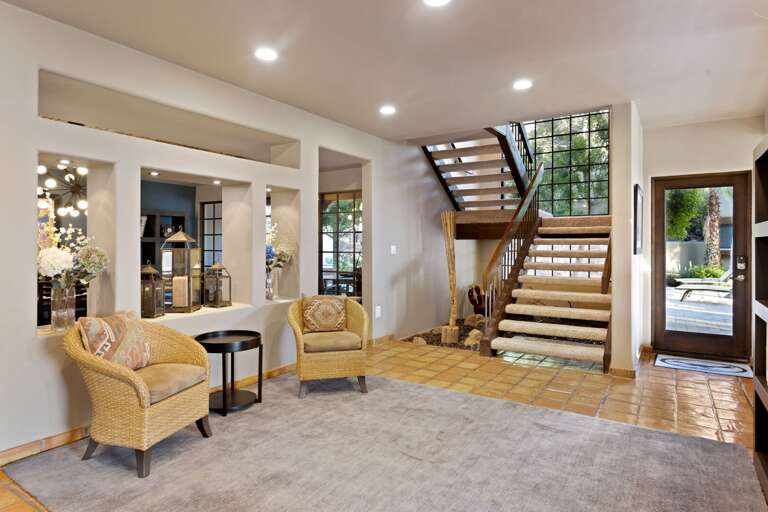 Lounge Area Near Stairway & Main Entrance Lounge Area Near Stairway & Main Entrance