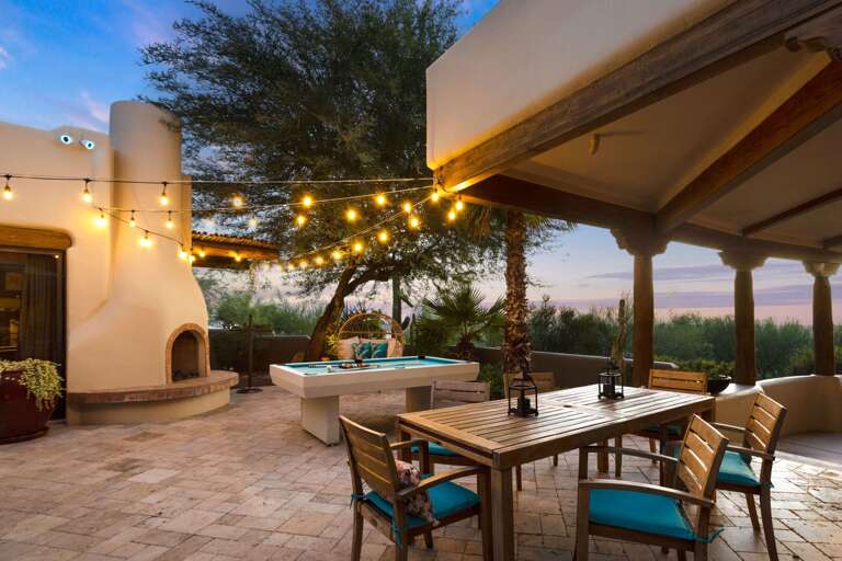 Outdoor Dining Area, Pool Table, & Lighting Outdoor Dining Area, Pool Table, & Lighting