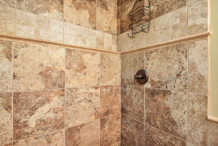 Bathroom 2 shared between the King and Bunk Room with a tub/shower combo Bathroom 2 shared between the King and Bunk Room with a tub/shower combo