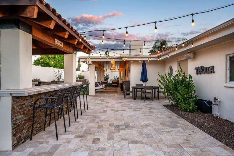 Bar Seating w/ Additional Outdoor Seating in Background Bar Seating w/ Additional Outdoor Seating in Background
