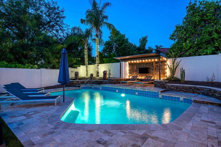 Evening Pool Lights Under Dark Blue Skies Evening Pool Lights Under Dark Blue Skies