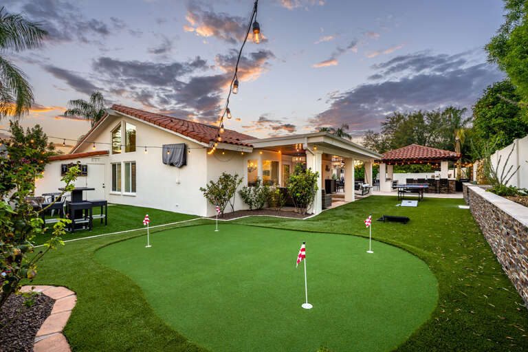 Outdoor seating area with Putt-Putt & Cornhole. Outdoor seating area with Putt-Putt & Cornhole.