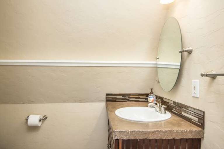 bath with shower and single vanity. bath with shower and single vanity.